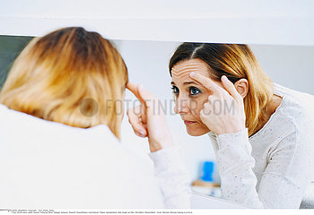 WOMAN WITH MIRROR