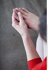 WOMAN WITH PAINFUL HAND