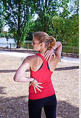 WOMAN WITH BACK PAIN