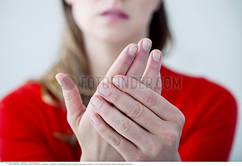 WOMAN WITH PAINFUL HAND