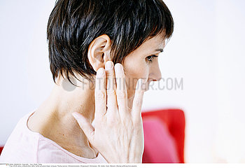 WOMAN WITH EAR PAIN
