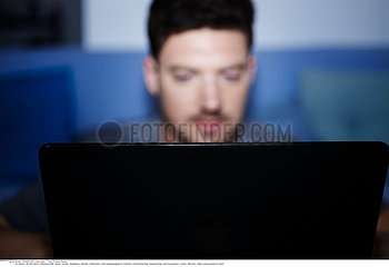 MAN WITH COMPUTER