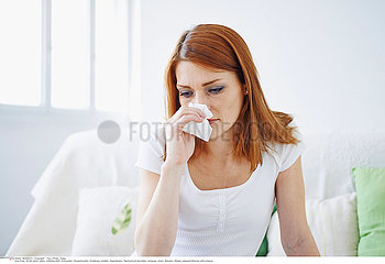 WOMAN WITH NOSEBLEED
