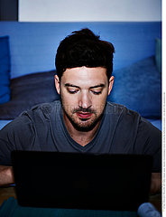 MAN WITH COMPUTER