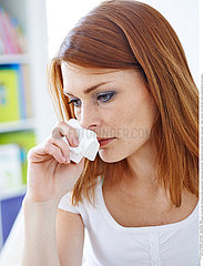 WOMAN WITH NOSEBLEED
