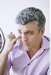 MAN WITH MIRROR