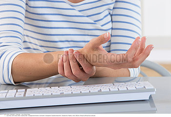 WOMAN WITH PAINFUL WRIST
