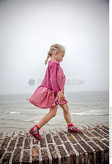 CHILD AT THE SEASIDE