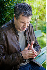 MAN WITH PAINFUL HAND