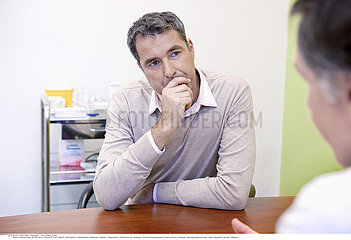 MAN IN CONSULTATION  DIALOGUE