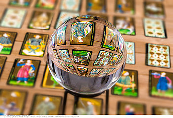 Fortune teller Crystal ball and in transparency tarot cards background .