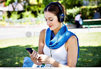 WOMAN LISTENING TO MUSIC