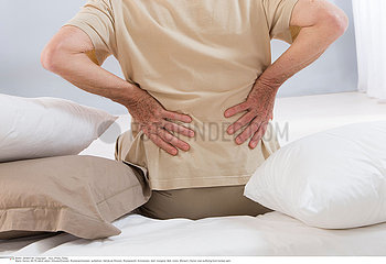 SENIOR WITH LOWER BACK PAIN