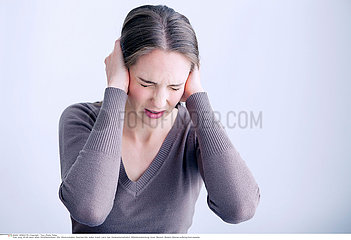 EAR PAIN IN A WOMAN