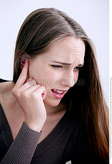 EAR PAIN IN A WOMAN