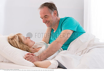 COUPLE IN BED