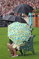 Royal Ascot  Audience under their umbrellas at the racecourse