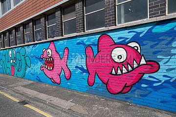 Grossbritannien  Nordirland  Belfast - Graffitis in der City  Piranhas vorne und links ein Oktopus