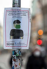 Deutschland  Bremen - Hinweis auf Maskenpflicht an einer Strasse