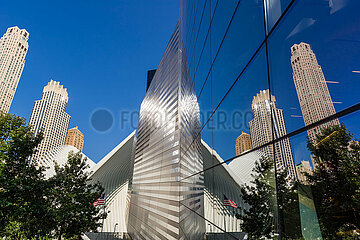 United States  New York City  Manhattan  Lower Manhattan. Glass reflection of the Oculus and skyscrapers at the 9/11 Memorial & Museum