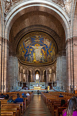 France. Paris (75) 18th Arr. Montmartre  Basilica of the Sacre Coeur. The cul-de-four of the apse is decorated with the largest mosaic in France  covering an area of ??473 m2. Designed by Luc-Olivier Merson and produced from 1918 to 1922  the fresco represents the Sacred Heart of Jesus (surrounded by the Virgin Mary and Saint Michael)
