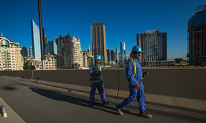 Vereinigte Arabische Emirat. DUBAI. Arbeiter im Trade-Center-Bezirk.
