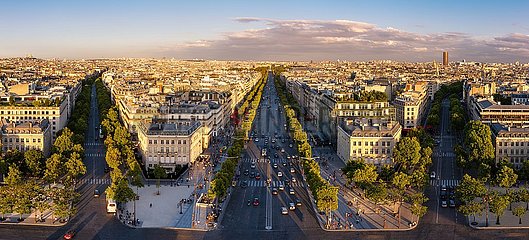 France  Paris  75008 (8th arrondissement). Summer view on the Champs-Elysees  Avenue de Friedland and Avenue Marceau at sunset. The panoramic view includes rooftops of Paris  the Montparnasse Tower and Monmartre in the distance