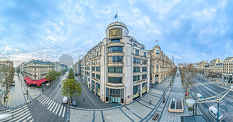 France. Paris (75) March 2020. First week of confinement due to the Coronavirus epidemic. Aerial view of the Champs Elysees near avenue George V (center left): the Fouquet's restaurant (left) and the Louis Vuitton store (right).