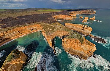 Australia. Aerial view of the Twelve Apostles Marine National Park  a protected marine national park located on the southwest coast of Victoria  Australia. The 7 500 hectare marine park is located near Port Campbell and owes its name to the picturesque rock piles of the Twelve Apostles