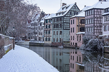 FRANCE  Alsace  Bas-Rhin (67)  Strasbourg  Quai de la Petite France under the snow in winter