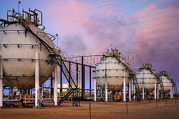 Algeria. Province of Ouargla: Sonatrach plant (Algerian oil and gas company) in the Algerian Sahara. Gas spheres on the Rhourde Nouss site (natural gas field). Sonatrach is the first company in Africa
