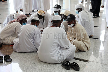 Dubai  Locals sitting on the ground