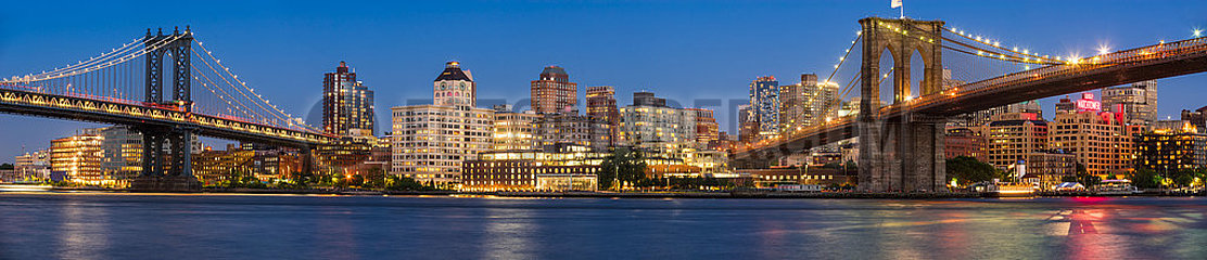 United States  New York City  Brooklyn  Dumbo. Evening panoramic view of Brooklyn Riverfront between the Manhattan Bridge and the Brooklyn Bridge. The view includes newly renovated Brooklyn waterfront