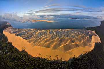 France  Gironde - 33 - Aerial view of Dune du Pyla  near Arcachon. In the background  the nature reserve of the Banc d'Arguin (left) and the Cap Ferret (right).This atmosphere of dunes by the sea evokes the coast of Namibia  Southern Africa