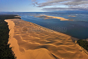 France. Gironde (33) at the entrance to the Arcachon basin  aerial view of the Dune du Pilat  the highest dune in Europe. In the background  the Banc d'Arguin nature reserve