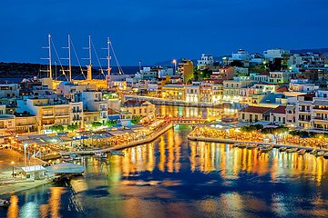 Beautiful Agios Nikolaos town at night. Lasithi region of Crete island  Greece