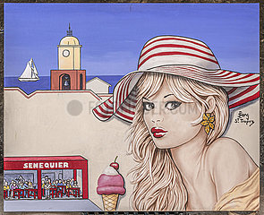 France. Provence. Var (83) Saint-Tropez. In the district of La Ponche  the oldest in the village  a stall on the Place de l'Ormeau which offers all kinds of paintings representing Brigitte Bardot