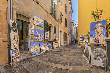 France. Provence. Var (83) Saint-Tropez. In the district of La Ponche  the oldest in the village  a stall on the Place de l'Ormeau which offers all kinds of paintings representing Brigitte Bardot