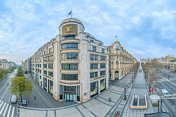 France. Paris (75) March 2020. First week of confinement due to the Coronavirus epidemic. Aerial view of the Champs Elysees at the height of Avenue George V: the luxury store Louis Vuitton