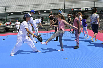 FRANCE. SEINE-SAINT-DENIS (93) OLYMPIC DAY. NEAR STADE DE FRANCE  JUNE 26  2022. TWO YEARS BEFORE THE KICK-OFF OF THE GAMES  THE SEINE-SAINT-DENIS IS VIBRATING TO THE OLYMPIC RHYTHM.