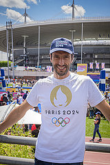 FRANCE. SEINE-SAINT-DENIS (93) SAINT-DENIS. TONY ESTANGUET  TRIPLE OLYMPIC CANOE CHAMPION AND TODAY PRESIDENT OF THE ORGANIZING COMMITTEE FOR THE PARIS 2024 OLYMPIC GAMES  VERY AVAILABLE DURING THE OLYMPIC DAY ON JUNE 26  2022  NEAR THE STADE DE FRANCE