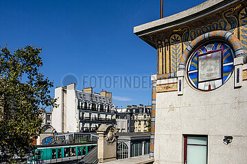 France. Paris (75) (10th district) The Luxor cinema room  Magenta boulevard (architect: Henri Zipcy). The metro and the Barbès Rochechouart station  seen from Luxor. neo-Egyptian style decoration on the top floor of the building