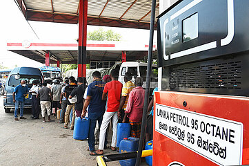 Sri Lanka. Motorists line up in front of a gas station. In 2022  the country went through an unprecedented economic crisis which led to the dismissal of the President of the Republic  Gotabaya Rajapaksa