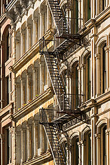 United States  New York City  Manhattan  Soho. Typical Soho building facades with fire escapes located in the Soho Cast Iron Building Historic District