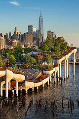 United States  New York City  Manhattan  West Village. Little Island public park with view of the World Trade Center. Artificial elevated park with amphitheater in the Meatpacking District at Hudson River Park (Pier 55)