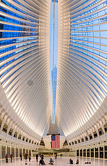 United States  New York  Lower Manhattan. At the foot of the One World Trade Center tower  the most futuristic station in New York: the Oculus and its new Westfield World Trade Center shopping center (architect: Santiago Calatrava). The Oculus replaced the old PATH (Port Authority Trans-Hudson) station  destroyed during the attacks of September 11  2001 and the collapse of the World Trade Center towers.