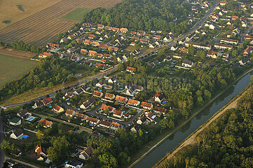 France. Seine-et-Marne (77) Aerial view of the Loing valley (Fontainebleau forest). Hot air balloon flight over the village of Montcourt-Fromonville with France Montgolfiere