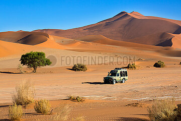 NAMIBIA. Namib-Naukluft National Park  4X4 vehicle in Sossusvlei