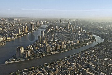 Egypt. Cairo. Aerial view of downtown modern Cairo from the left bank of the Nile. Between the two arms of the river  the island of Zamalek