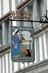 France. Brittany. Cotes d'Armor (22) Dinan. Restaurant Chez La Mere Pourcel  half-timbered house (PHOTO NOT AVAILABLE IN CALENDAR AND POSTCARD)